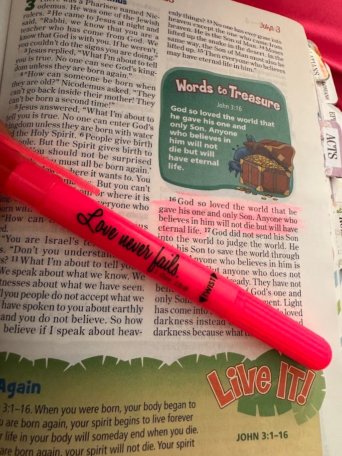Bible with Love Never Fails highlighter